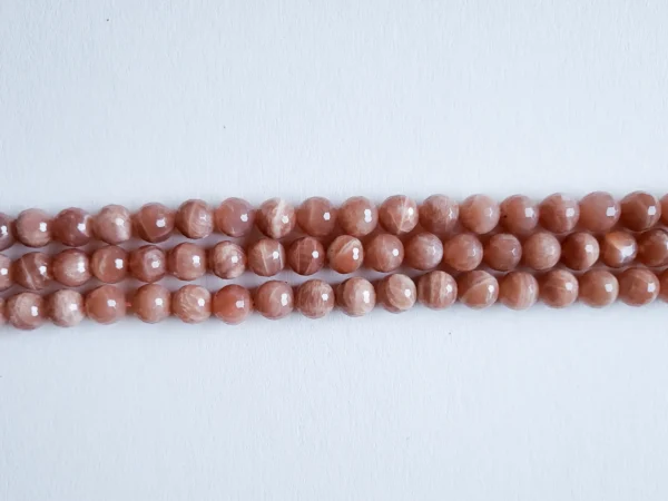 Fil de perles en Feldspath (pierre de soleil) orange - 8mm