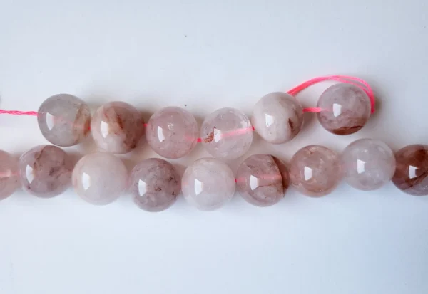 Fil de perles en Quartz rose - 18mm