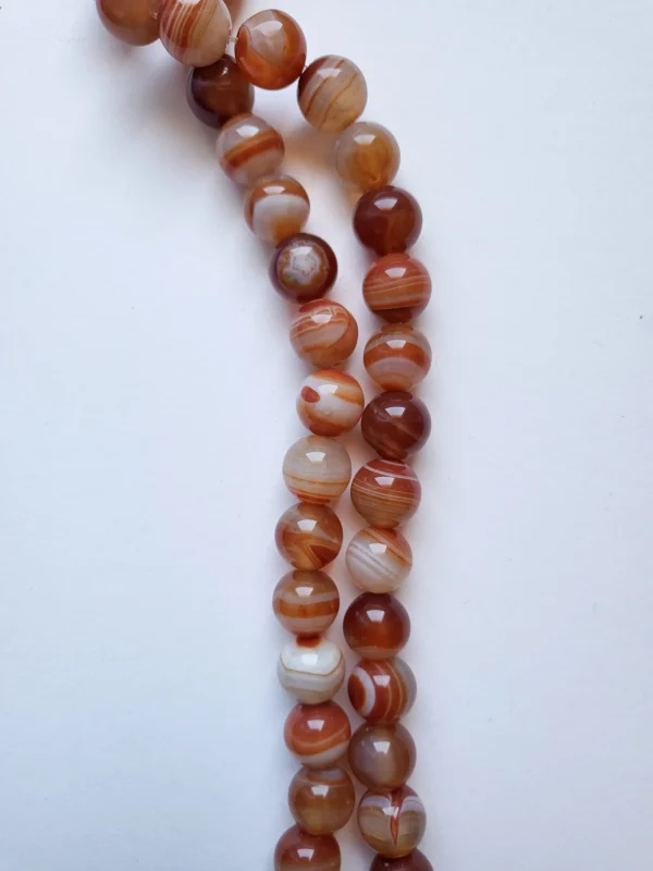 Fil de perles en Agate rouge Rond - 12mm