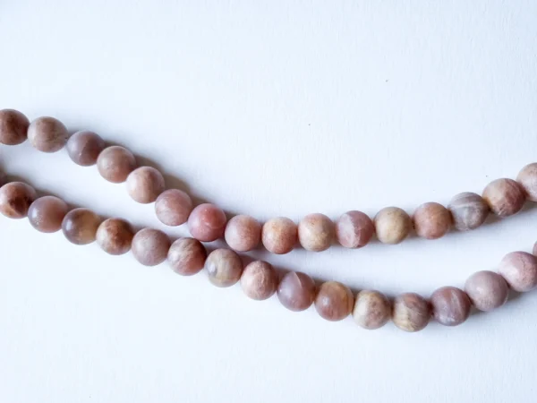 Fil de perles en Pierre de lune mat rose - 10mm