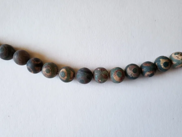 Fil de perles en Agate Marron - 12mm