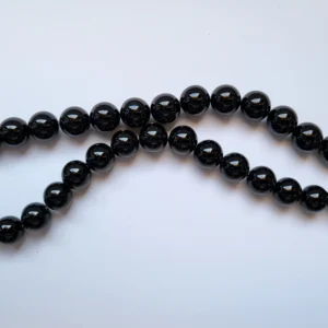 Fil de perles en Onyx noir - 12mm