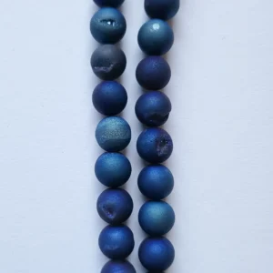 Fil de perles en Agate géode Bleu irisé - 10mm