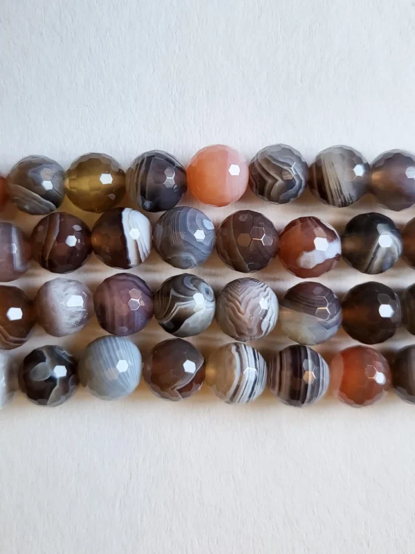 Fil de perles en Agate A Gris et Orange Facettée - 8mm